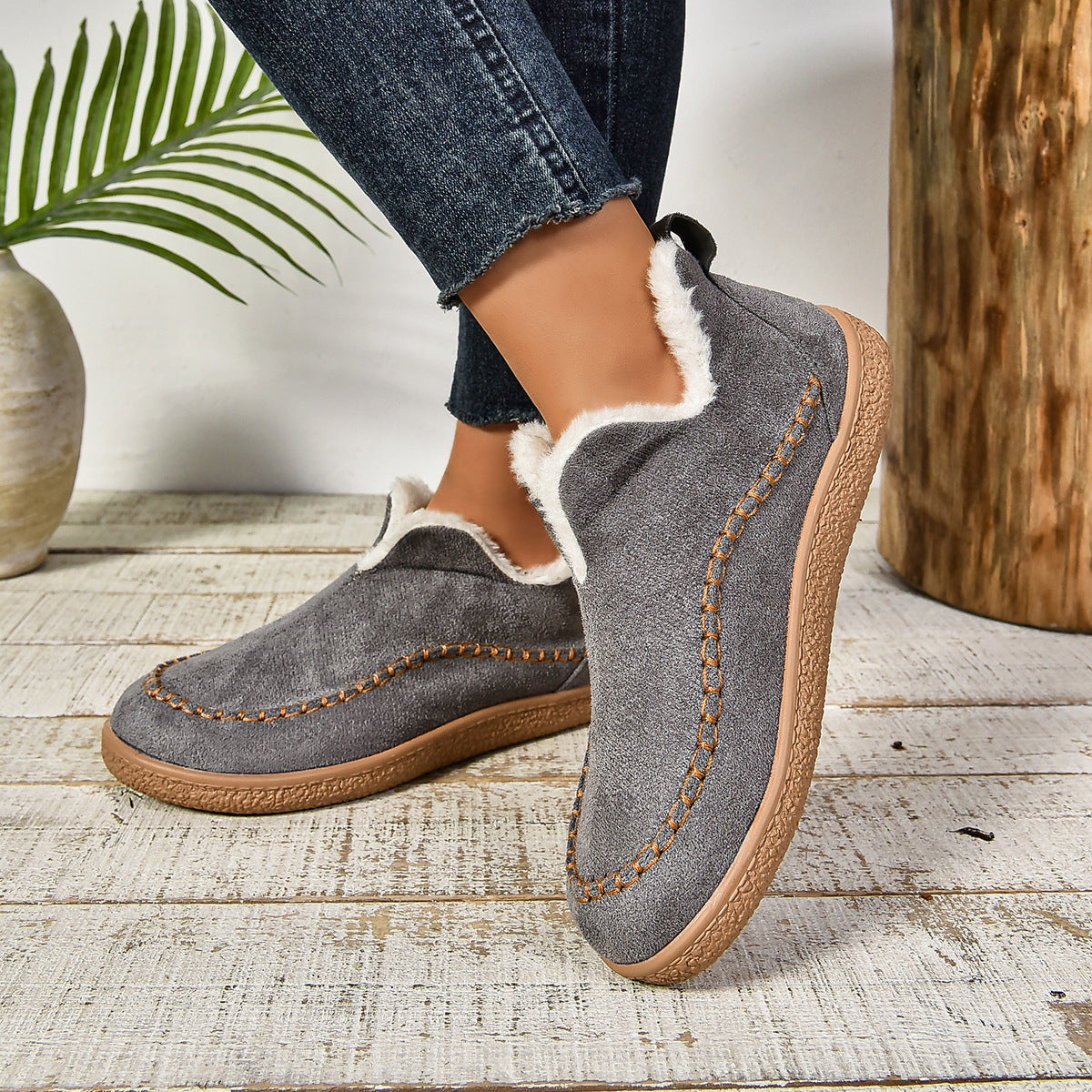 Auldweave women's fleece-lined winter slip-on shoes – grey shoes worn in a side view