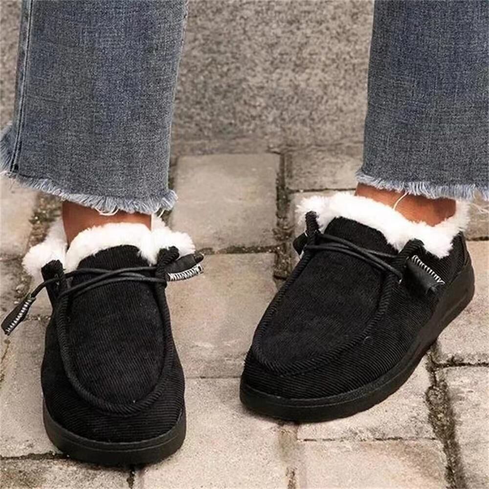 Auldweave women's lightweight fleece-lined winter shoes – black pair worn from the front