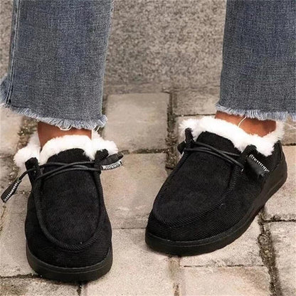 Auldweave women's lightweight fleece-lined winter shoes – black pair worn from the front