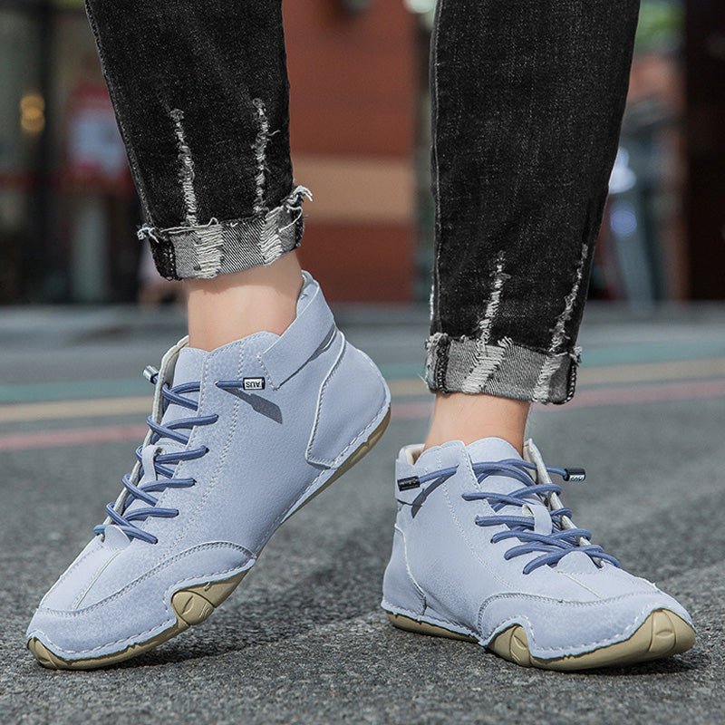 Unisex leather boots with wide toe design and adjustable ankle strap