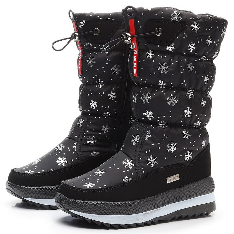 Auldweave women's waterproof mid-calf snow boots – black snowflake pair studio view