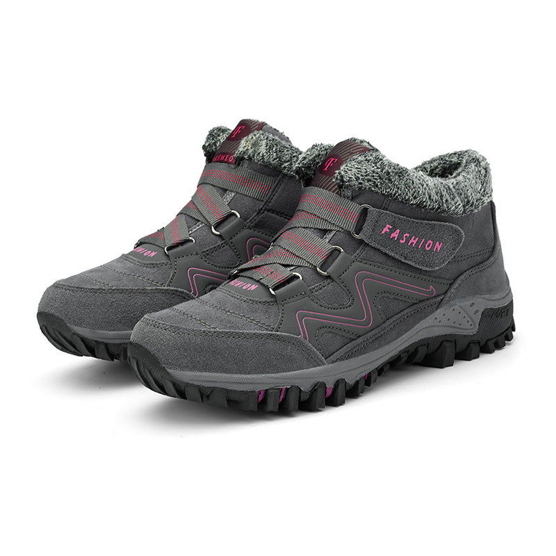 Grey and pink winter boots with fleece collars and hook-and-loop straps