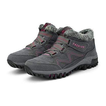 Grey and pink winter boots with fleece collars and hook-and-loop straps
