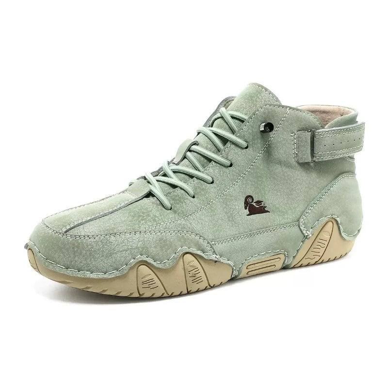 Light green unisex wide toe leather ankle boot with laces and ankle strap, side view