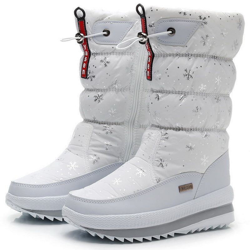 Auldweave women's waterproof mid-calf snow boots – white snowflake pair studio view