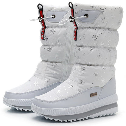 Auldweave women's waterproof mid-calf snow boots – white snowflake pair studio view
