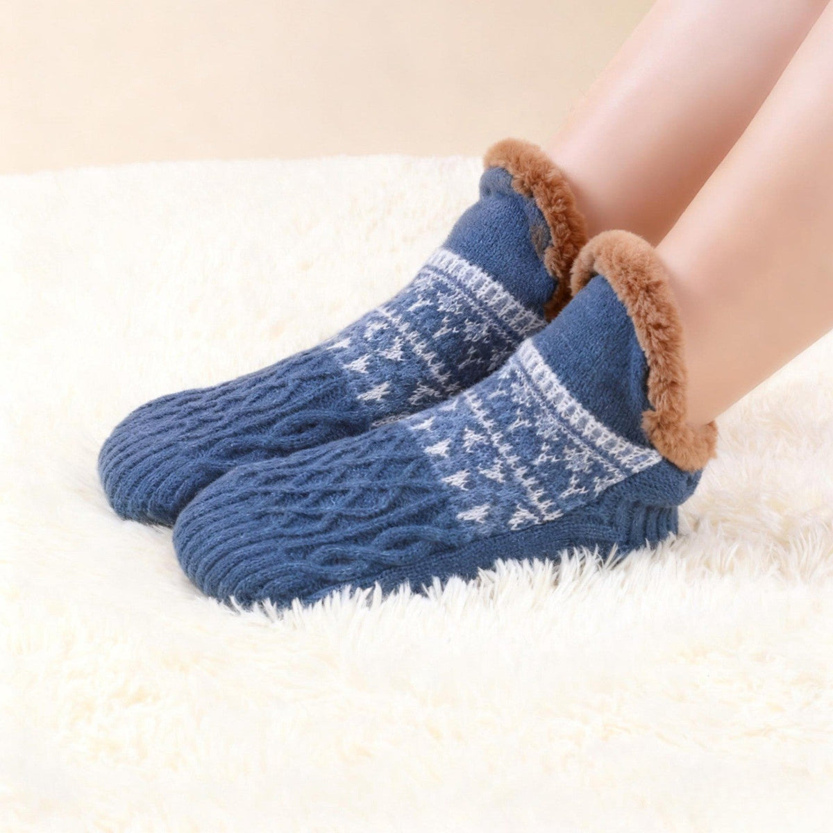 Auldweave warm fleece-lined slipper socks – blue pair worn on a soft rug
