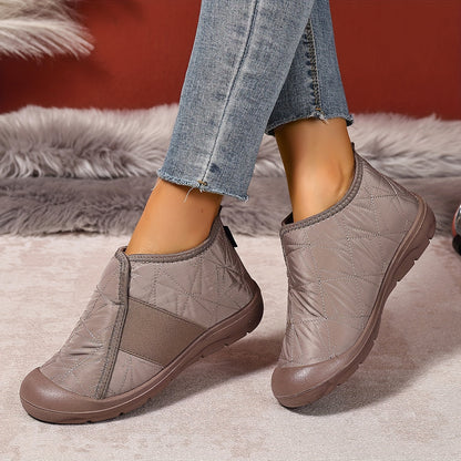 Fleece-lined slip-on ankle boots – taupe pair worn with jeans