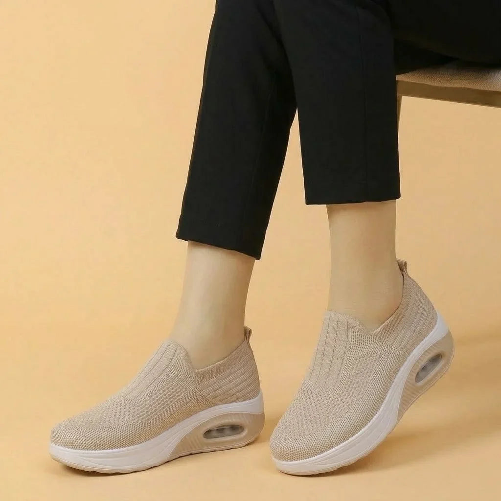 Women's walking trainers shown on foot