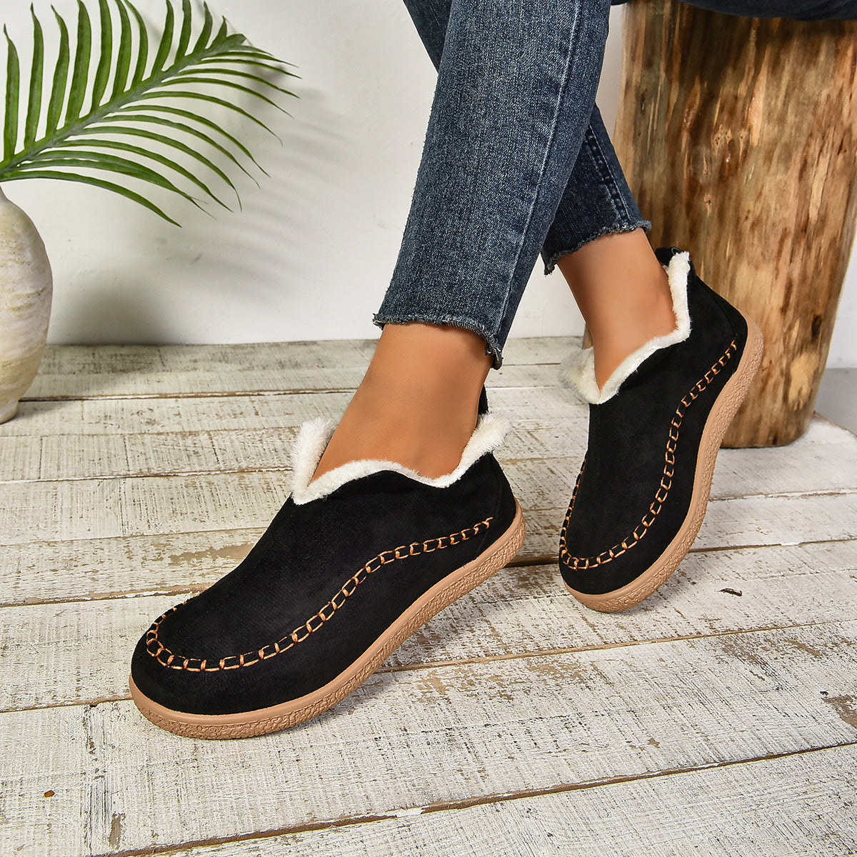 Auldweave women's fleece-lined winter slip-on shoes – black shoes worn from the front