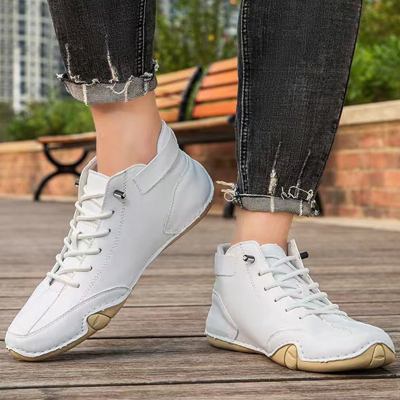 Unisex leather boots with wide toe design and adjustable ankle strap