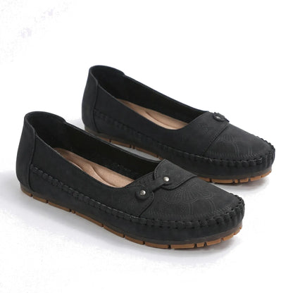 Women's black loafers, product view