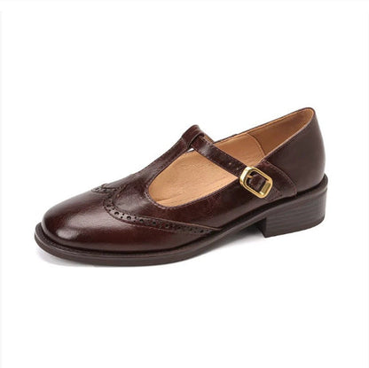 Dark brown women's wide fit Mary Jane brogue flat with T-bar buckle strap, side view