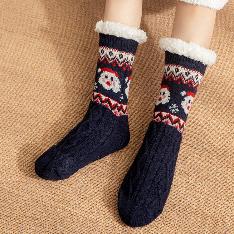 Christmas fleece-lined slipper socks – dark pair standing indoors