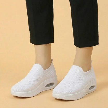 Women's walking trainers shown on foot