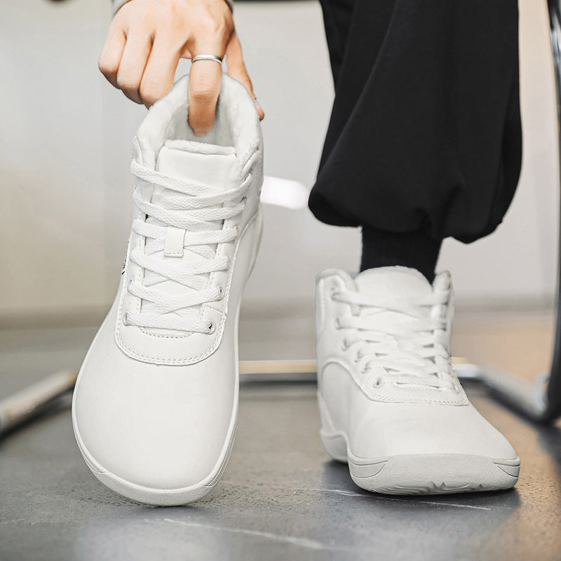 Fleece-lined lace-up winter boots – white pair being put on