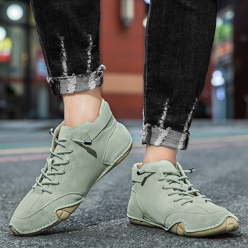 Unisex leather boots with wide toe design and adjustable ankle strap