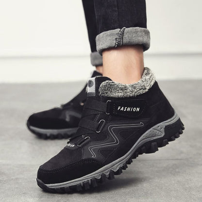 Side view of black and white winter boots showing the sole
