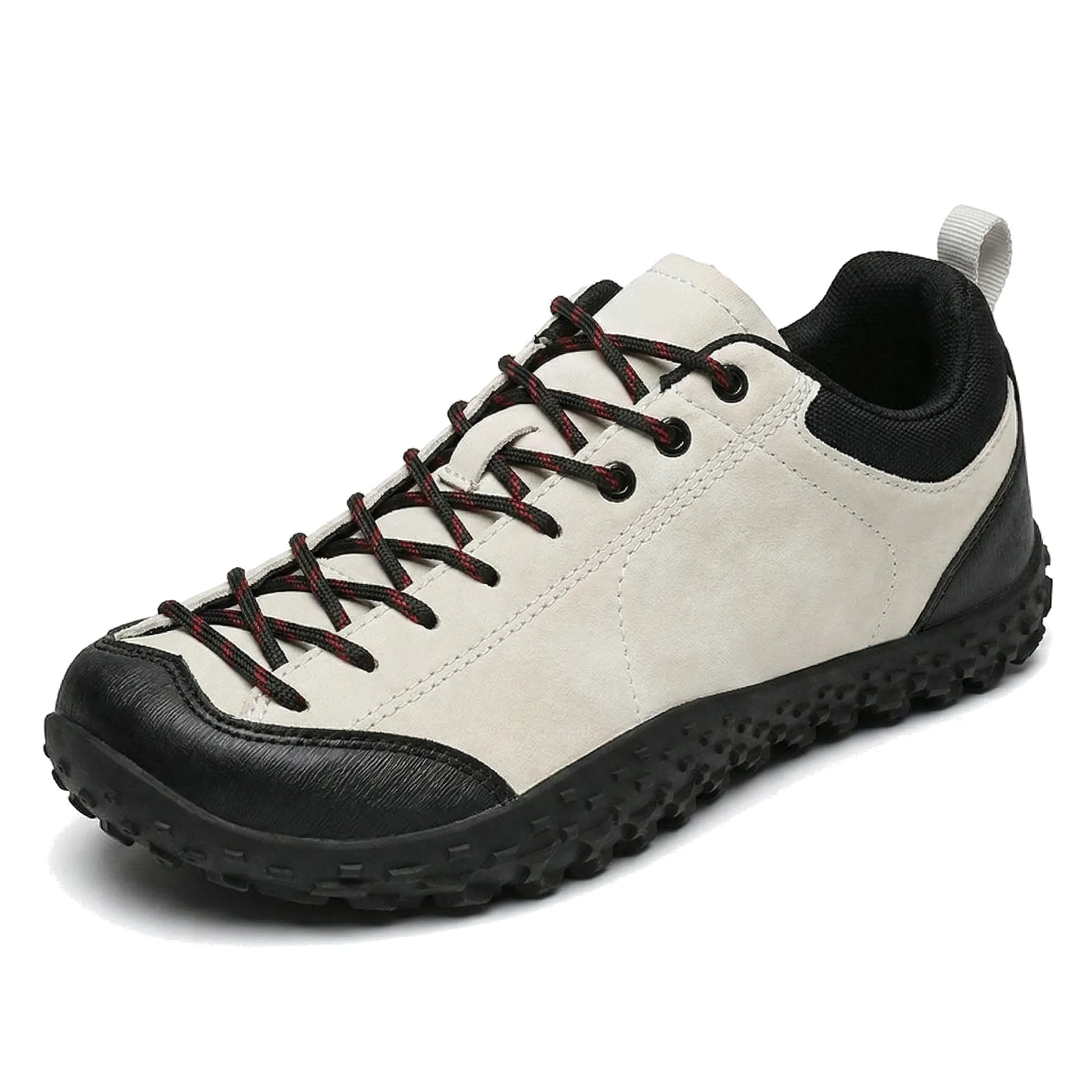 Unisex white and black wide toe box trainers, side profile on a white background