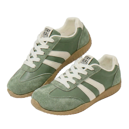 Women's wide fit trainers in olive green, pair on white background