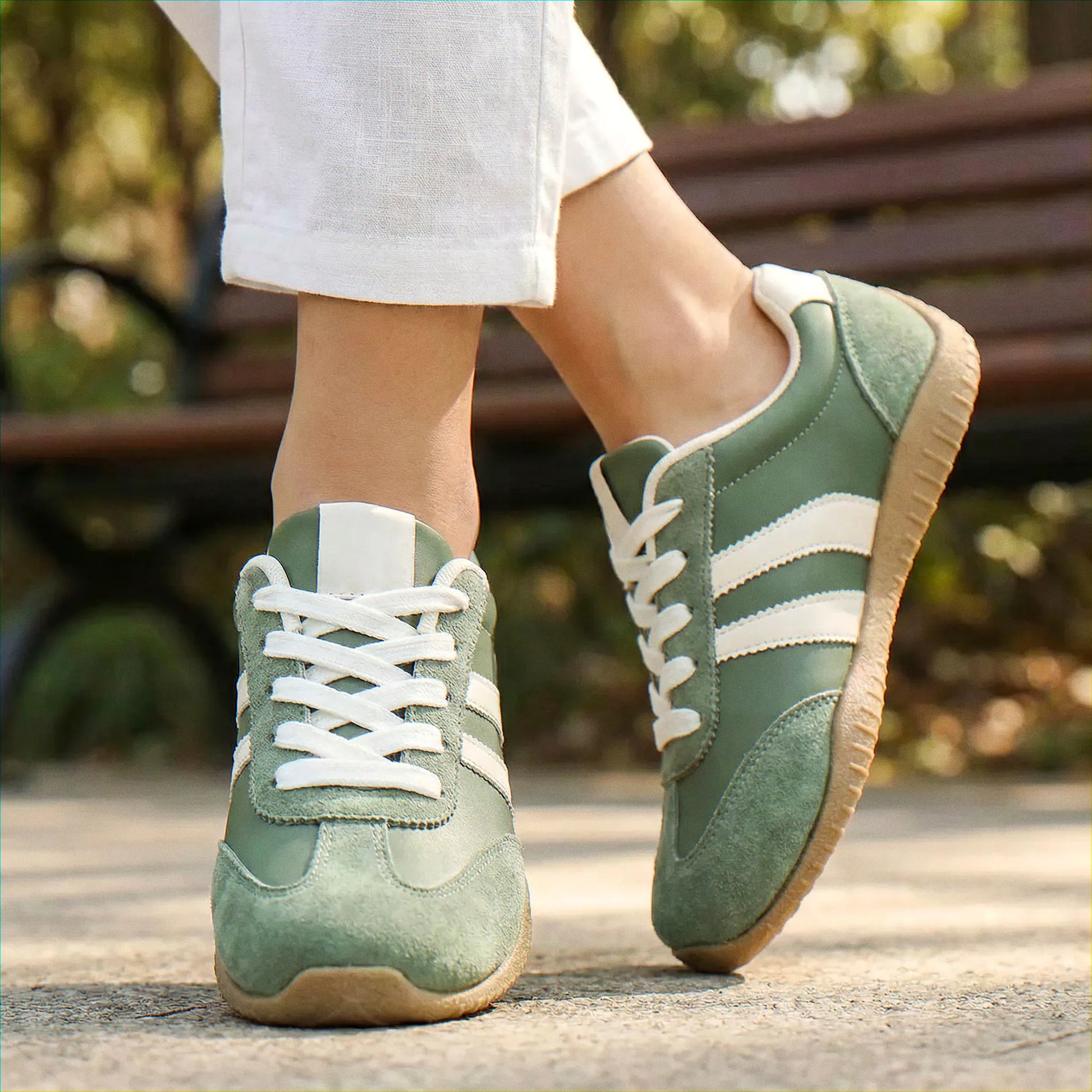 Olive green trainers for women, close on-foot park view