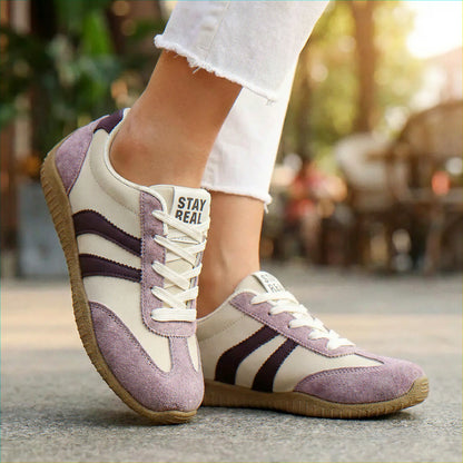 Lavender wide fit trainers, close on-foot park view