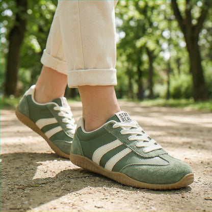 Olive green walking trainers for women, path lifestyle view