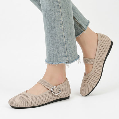 Beige Mary Jane flat shoes with square toe and buckle strap worn with jeans