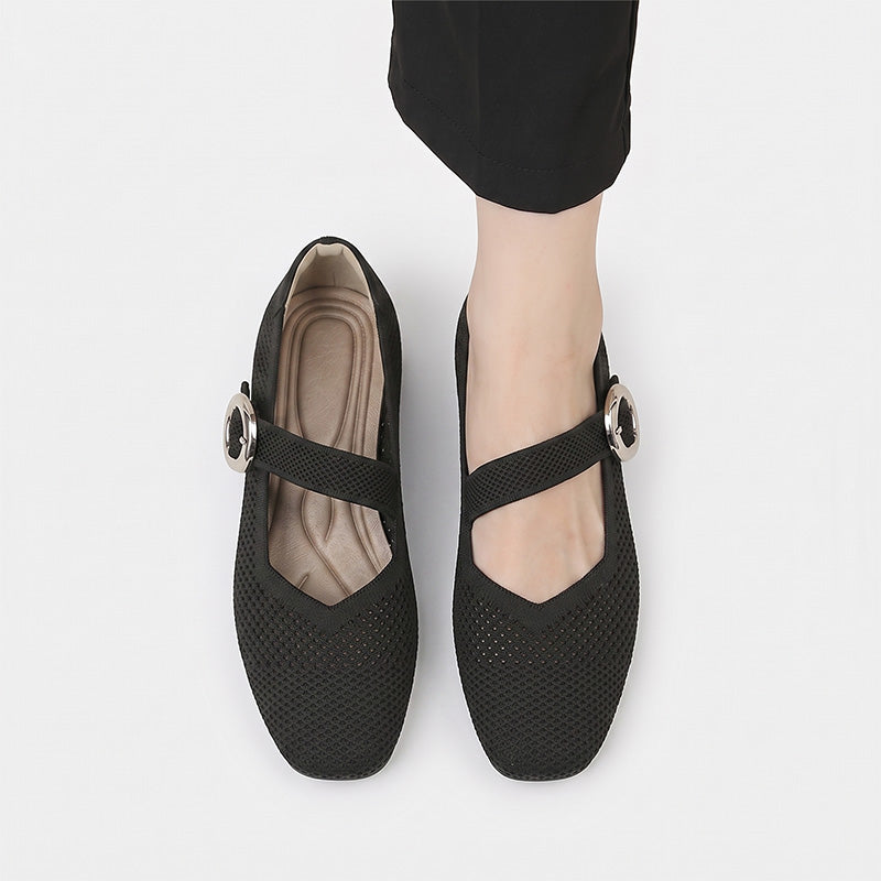 Top view of black women's Mary Jane flats showing square toes and cushioned footbeds