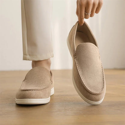 Mocha men's slip on loafers shown on foot and held from above