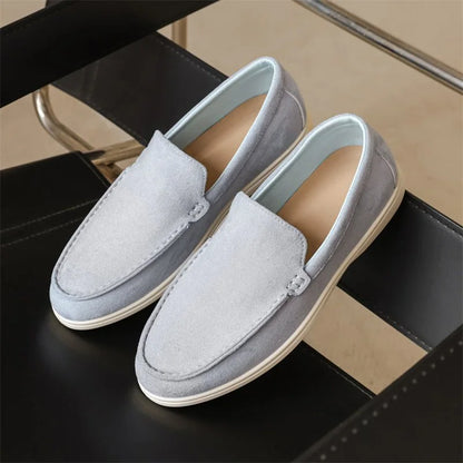 Fog blue men's slip on loafers, paired indoor studio view