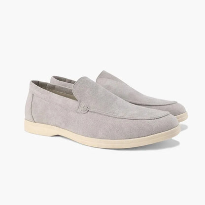 Light grey men's loafers, paired side studio view