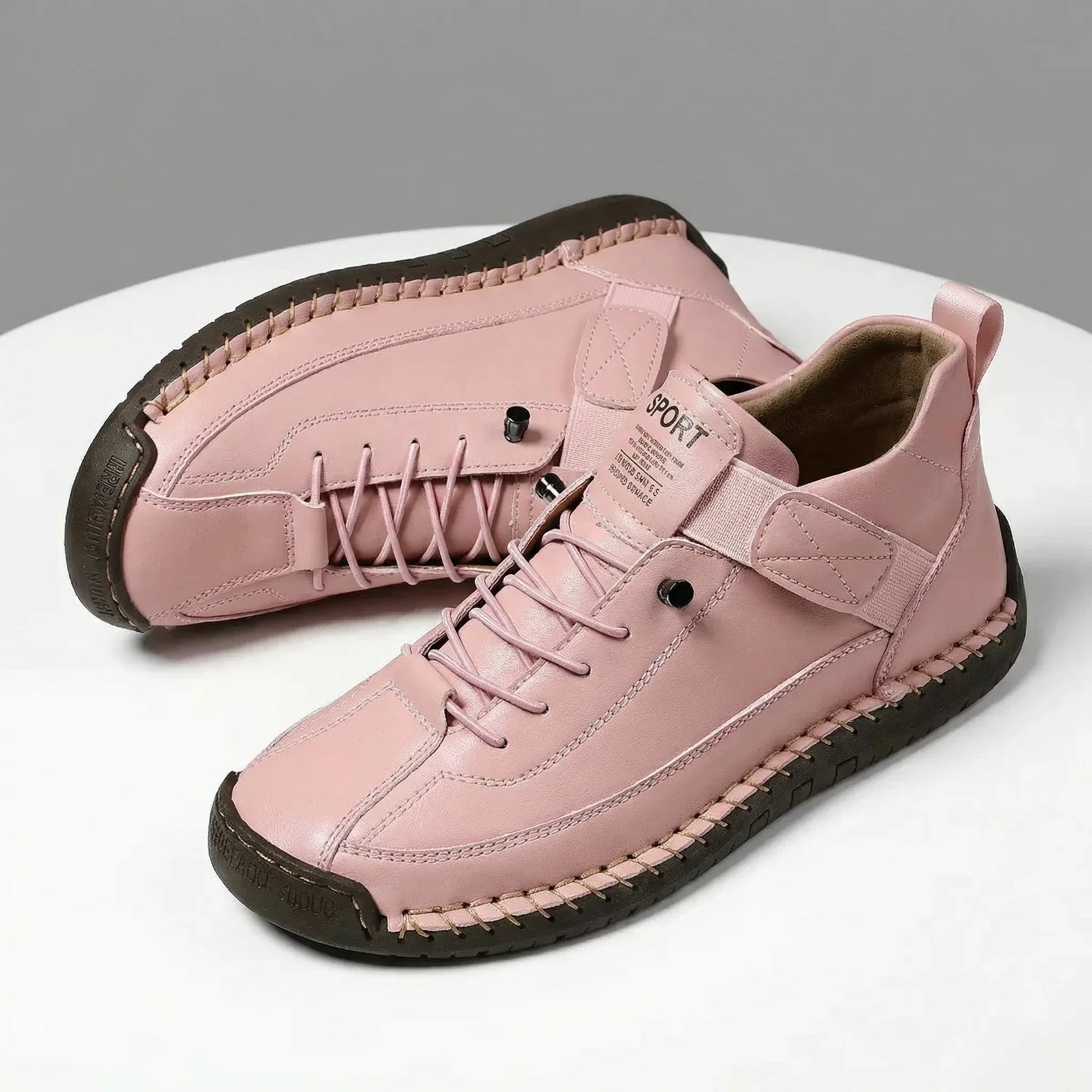 Blush pink women’s wide fit trainers with elastic laces