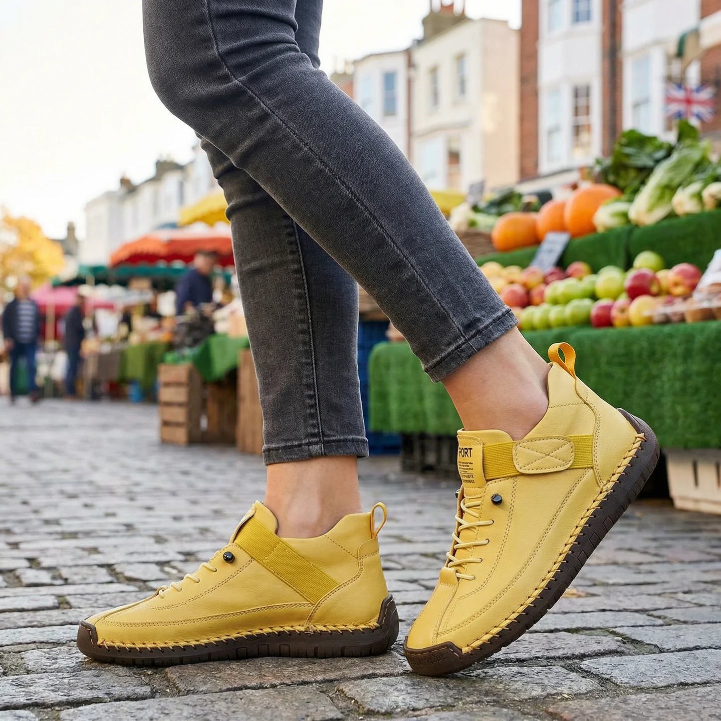 Woman wearing mustard yellow wide toe box trainers for everyday casual wear