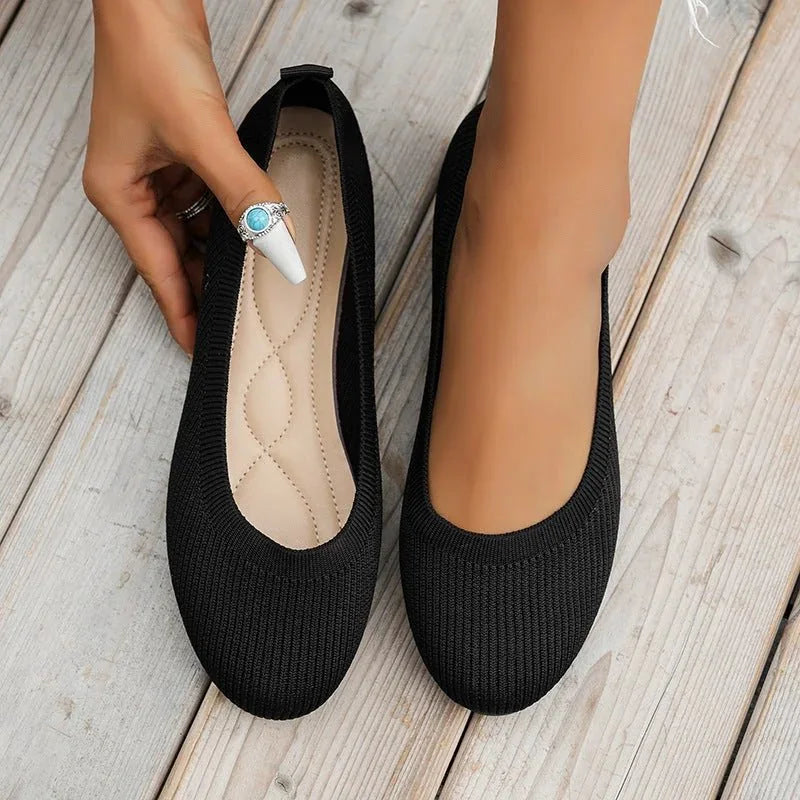 Women's knit loafer flats shown on foot