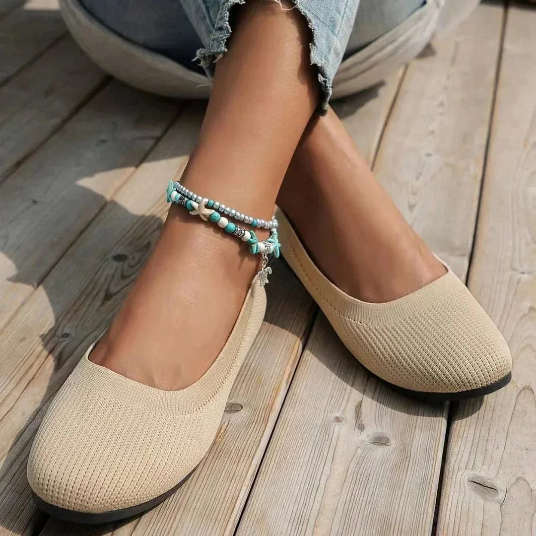 Women's knit loafer flats shown on foot