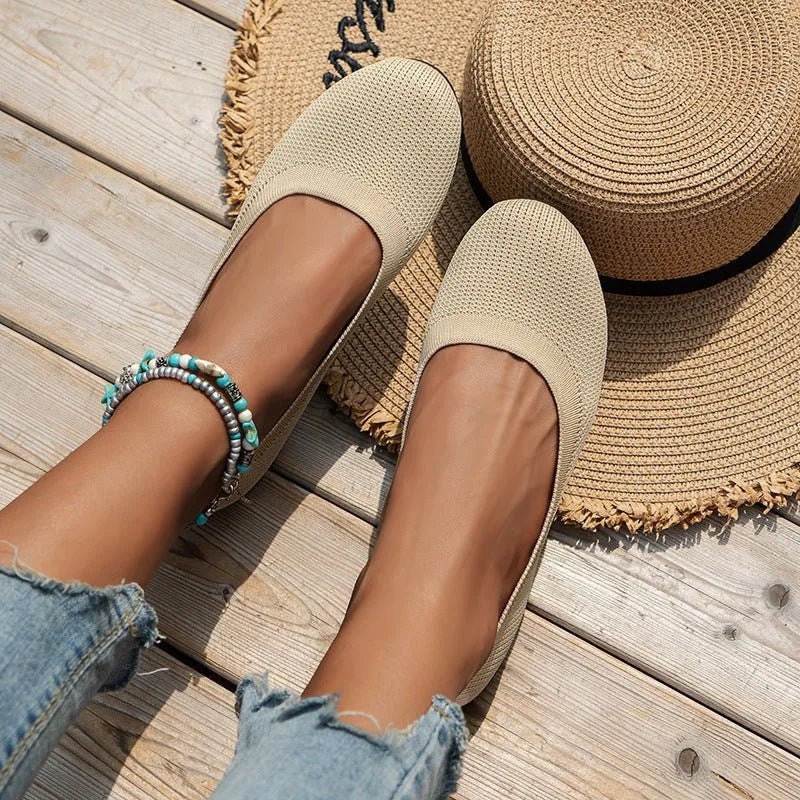 Women's knit loafer flats shown on foot