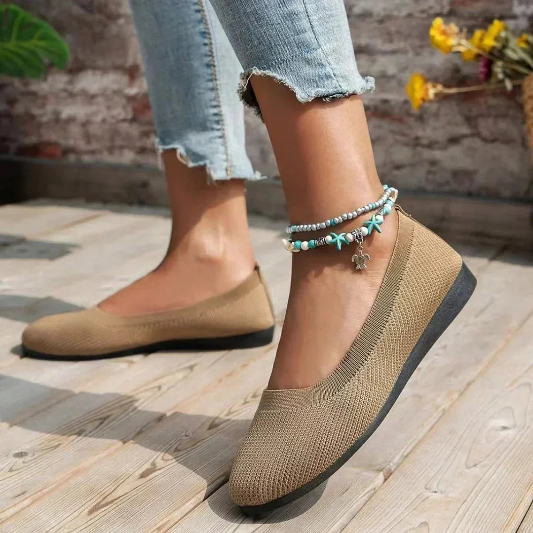 Women's knit loafer flats shown on foot