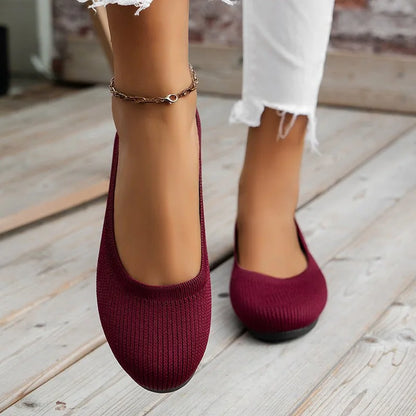 Women's knit loafer flats shown on foot