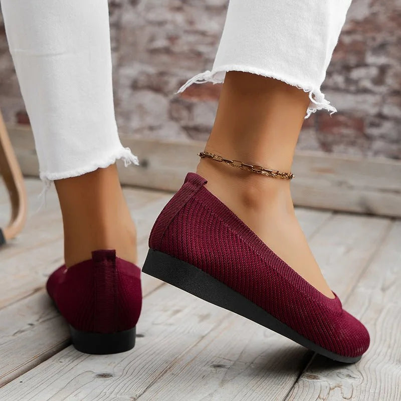 Women's knit loafer flats shown on foot