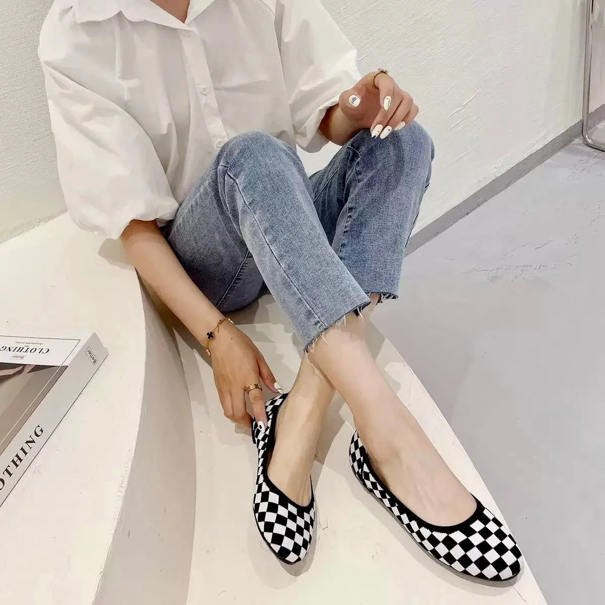 Women's knit loafer flats shown on foot