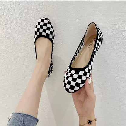 Women's knit loafer flats shown on foot
