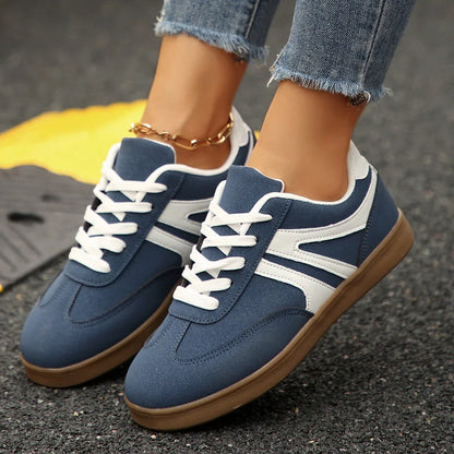 Blue wide fit trainers for women, close on foot view