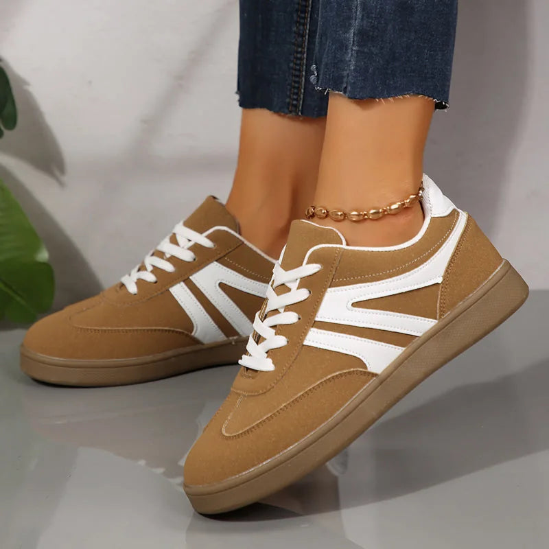Brown wide fit trainers for women, side on foot view