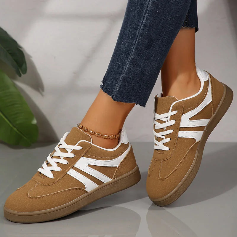 Brown walking trainers for women, close on foot view