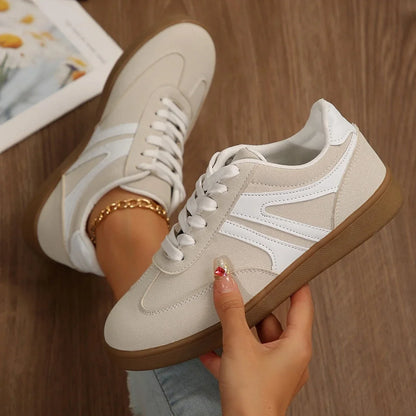 White wide fit trainers for women, top down on foot view