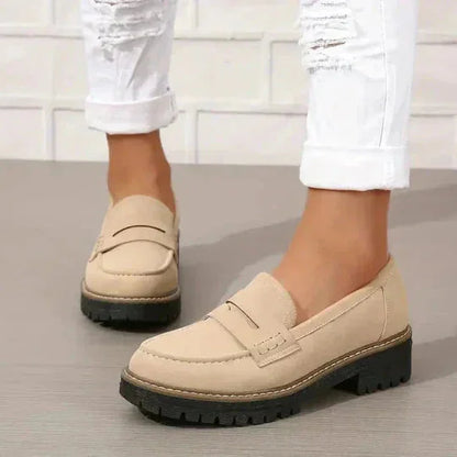 Beige platform loafers for women, on foot front view