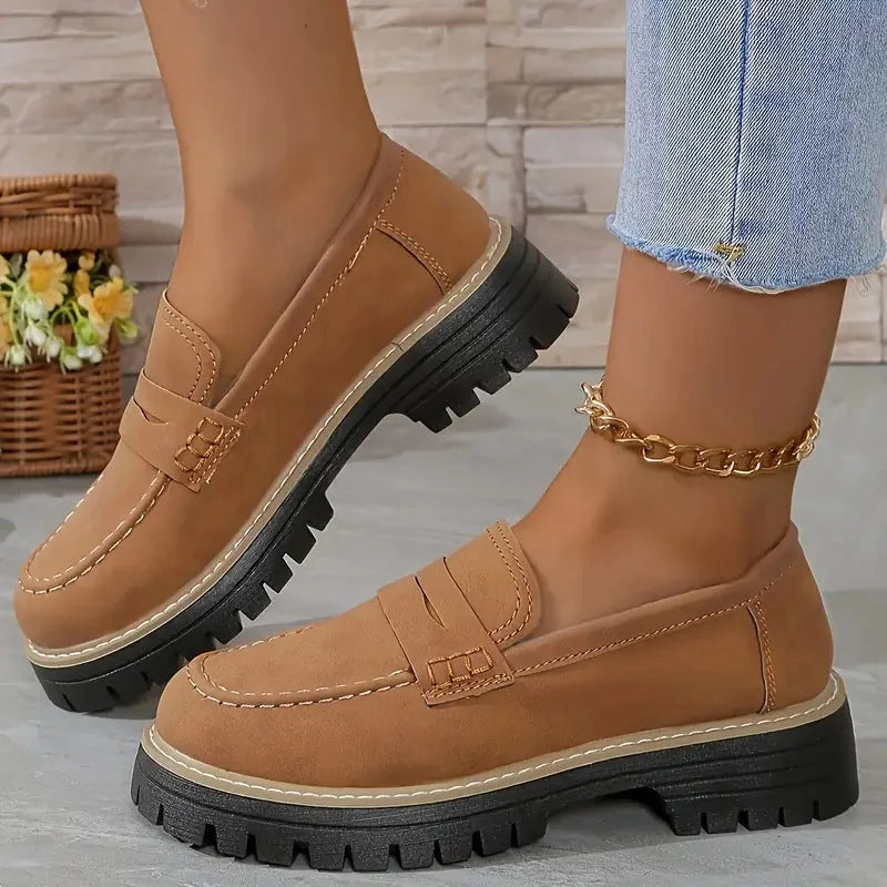 Brown chunky loafers for women, on foot side view