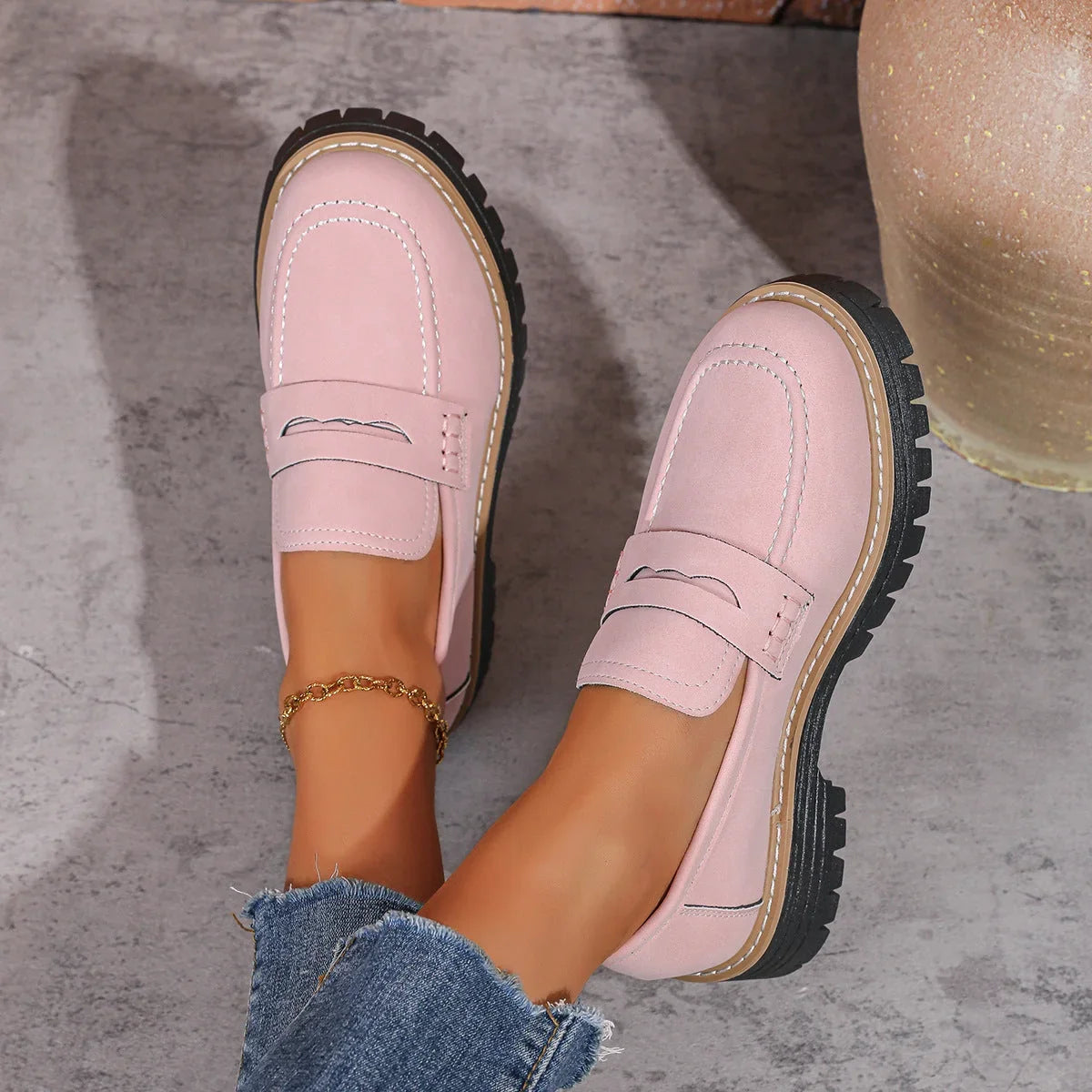 Pink chunky sole loafers, top on foot view