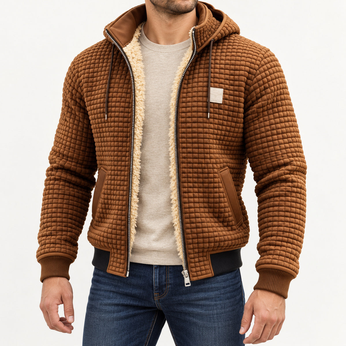 Front view of the coffee brown textured hooded jacket worn over an oatmeal jumper.
